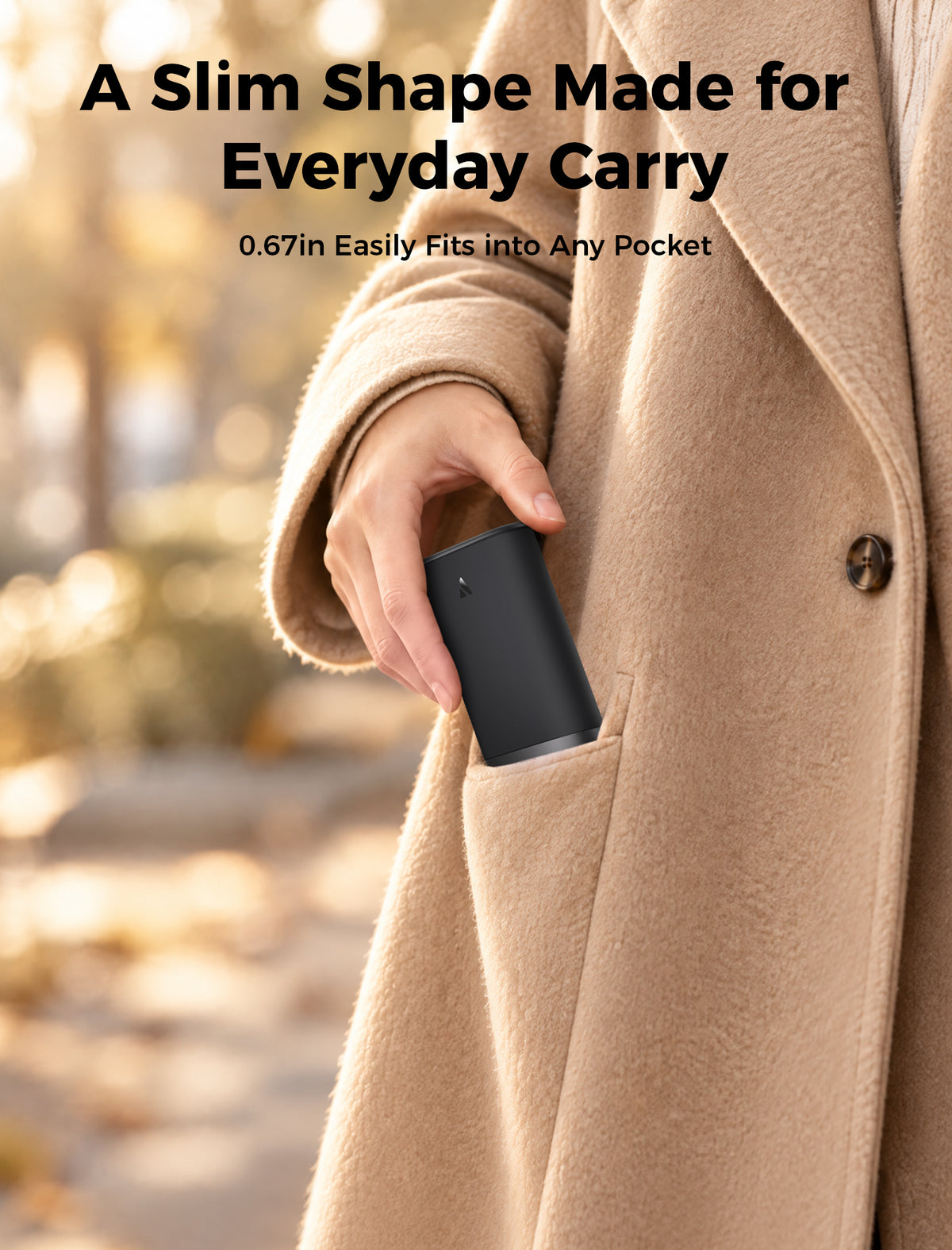 Gray Glow Air hand warmer slipping into a coat pocket, 0.67 inch slim profile