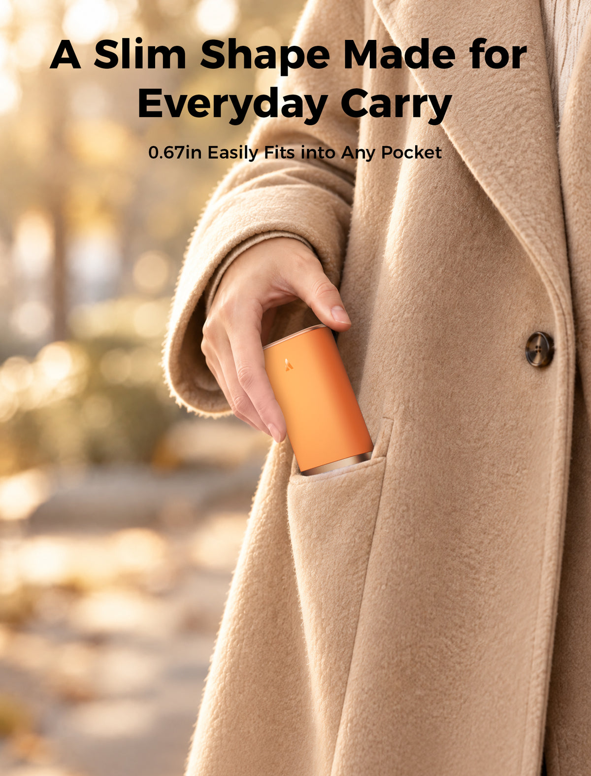 Orange Glow Air hand warmer slipping into a coat pocket, 0.67 inch slim profile
