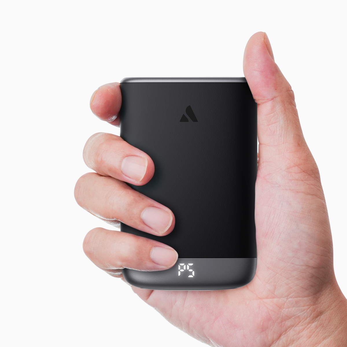 Gray Glow Air hand warmer held in one hand, showing palm-sized ergonomic fit
