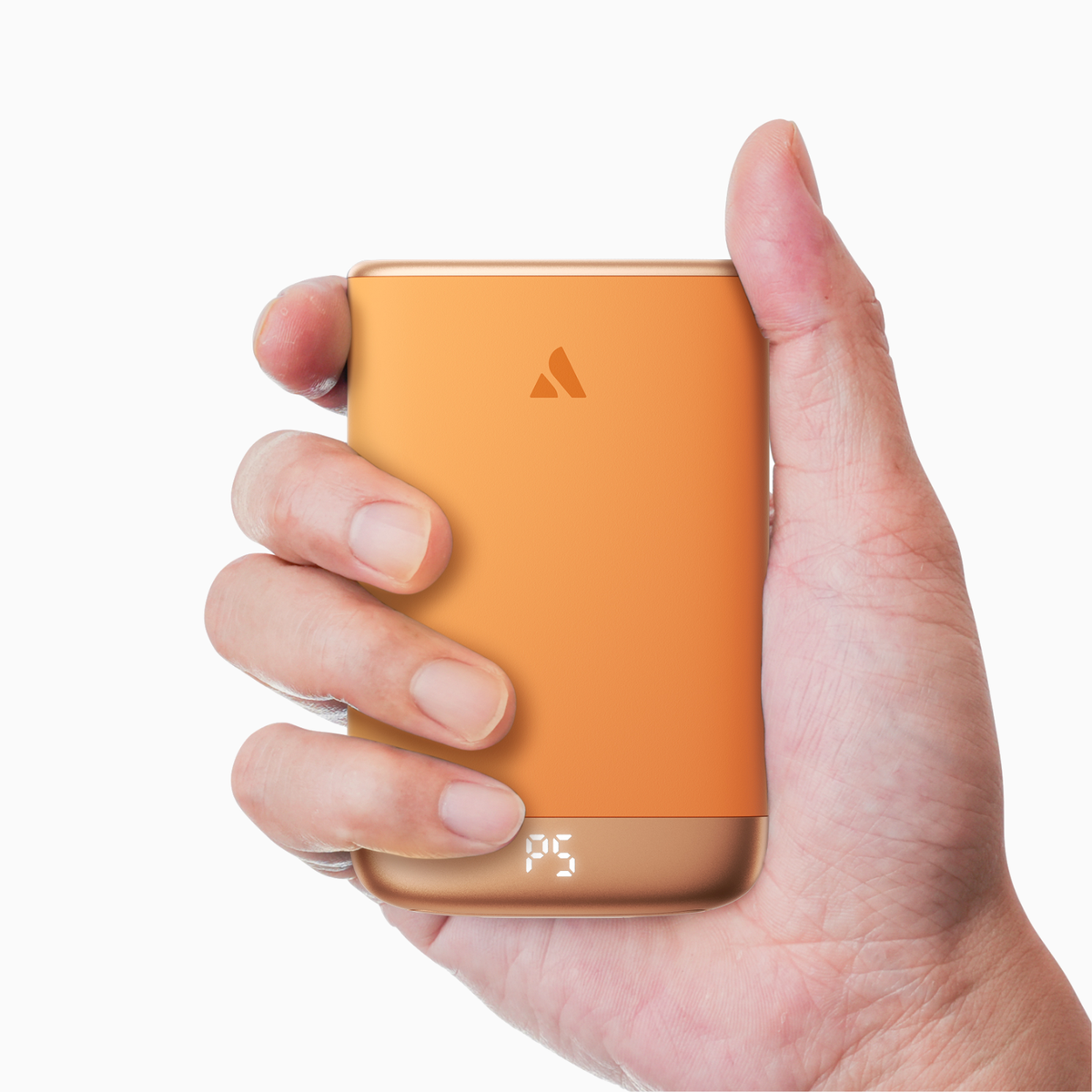 Orange Glow Air hand warmer held in one hand, palm-sized slim body
